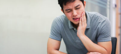 Close,Up,Asian,Middle,Aged,Man,Feeling,Hurt,From,Toothache